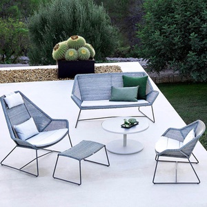 Fauteuil lounge BREEZE Cane-line gris-blanc avec coussin noir