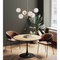Table 110cm SCHICKERIA Kare Design aspect chêne et pied noir